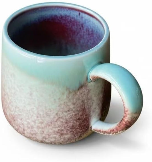 Handcrafted Ceramic Coffee Mug, Mint Blue and Pink, Textured Surface, Modern Design