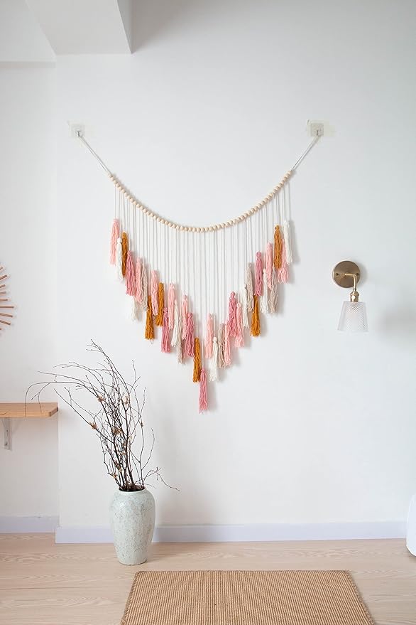 Decocove Macrame Wall Hanging - Large Macrame Wall Hanging with Wood Beads - Bohemian Wall Decor for Bedroom, Living Room and Kitchen - Pink and Gold- 35'' x 36''