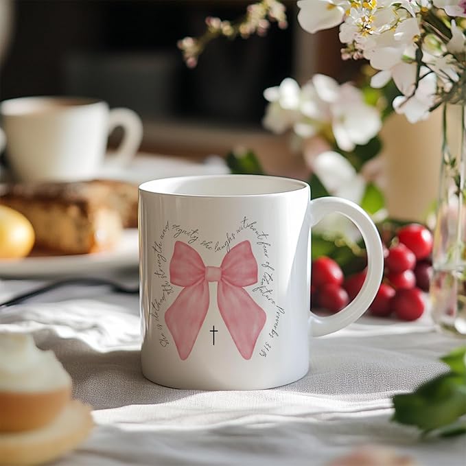 Christian Bible Verse Pink Bow Coffee Mugs for Women, Coquette Encouragement Inspirational Christian Gifts for Women, She Is Clothed With Strength and Dignity Mug, 11oz Ceramic Cup White